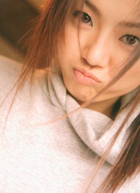 Cute, busty asian idol with soft pink lips in cotton lingerie