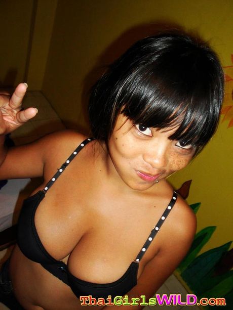 Random pictures of Thai teen Gail and her massive tits