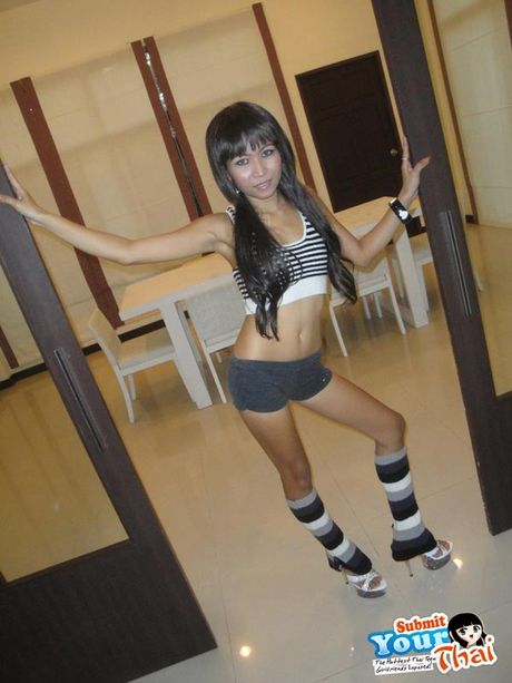 Little Thai teen named O shows off her little petite body