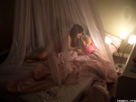 sweet girl breast feeds her plushy bunny