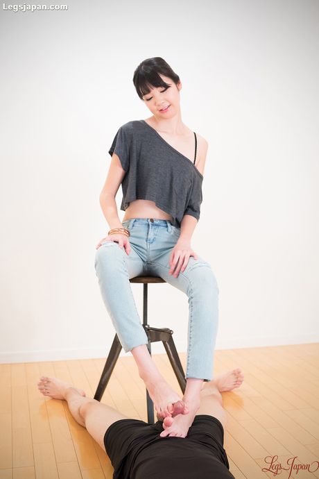 Skinny Asian teen Matsuda Anna strips and shows her tiny tits and feet