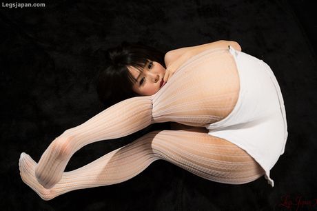 Skinny Japanese teen Sakura Sena strips and shows her tiny tits and ass