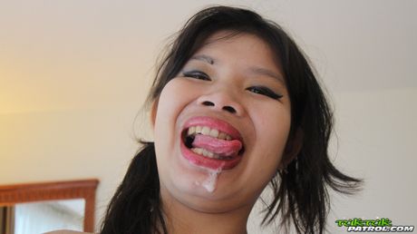 Asian teen Nana strips and shows her tiny tits and pussy in a solo