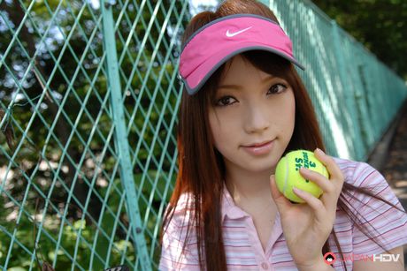 Beautiful tennis player Nazuna Otoi  showing her beauty outdoors