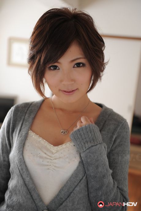 Asian Kaede Oshiro with busy mouth shows sexy legs in hot photos.