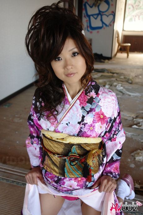 Asian teen Chiaki strips and shows her hairy pussy in a solo