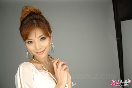 Stunning Asian teen Akane Hotaru strips and shows her perfect tits and ass