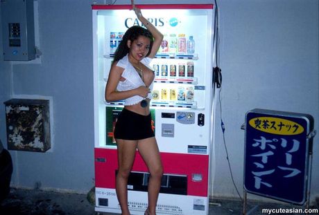 Stunning Asian wife with tiny tits and a perfect butt strips and poses outdoors