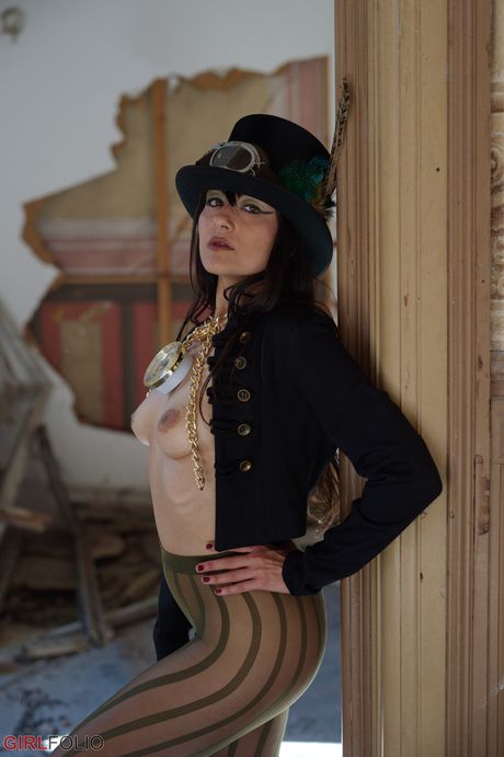 Asian teen Sophia Jade strips to her pantyhose and shows her big juggs