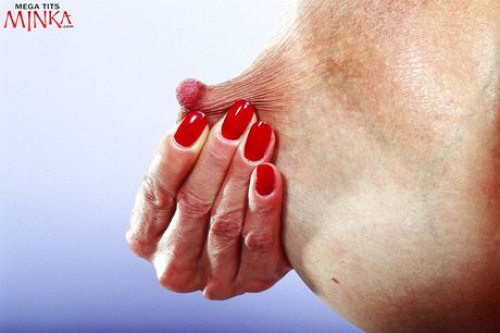 Enchanting oriental milf Minka in fancy shorts shows big titties and puts a toy in her pussy